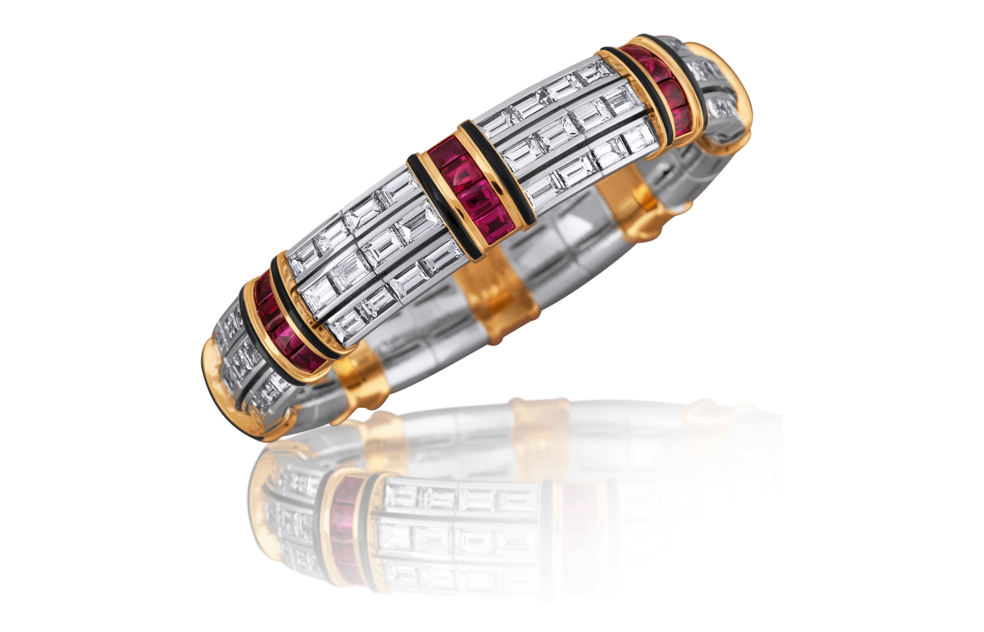 Picchiotti Xpandable bracelet with 96 baguette-cut diamonds totalling 19.63 carats, 32 buff top rubies with a total weight of 9.19 carats, and onyx, set in 18k white and yellow gold 