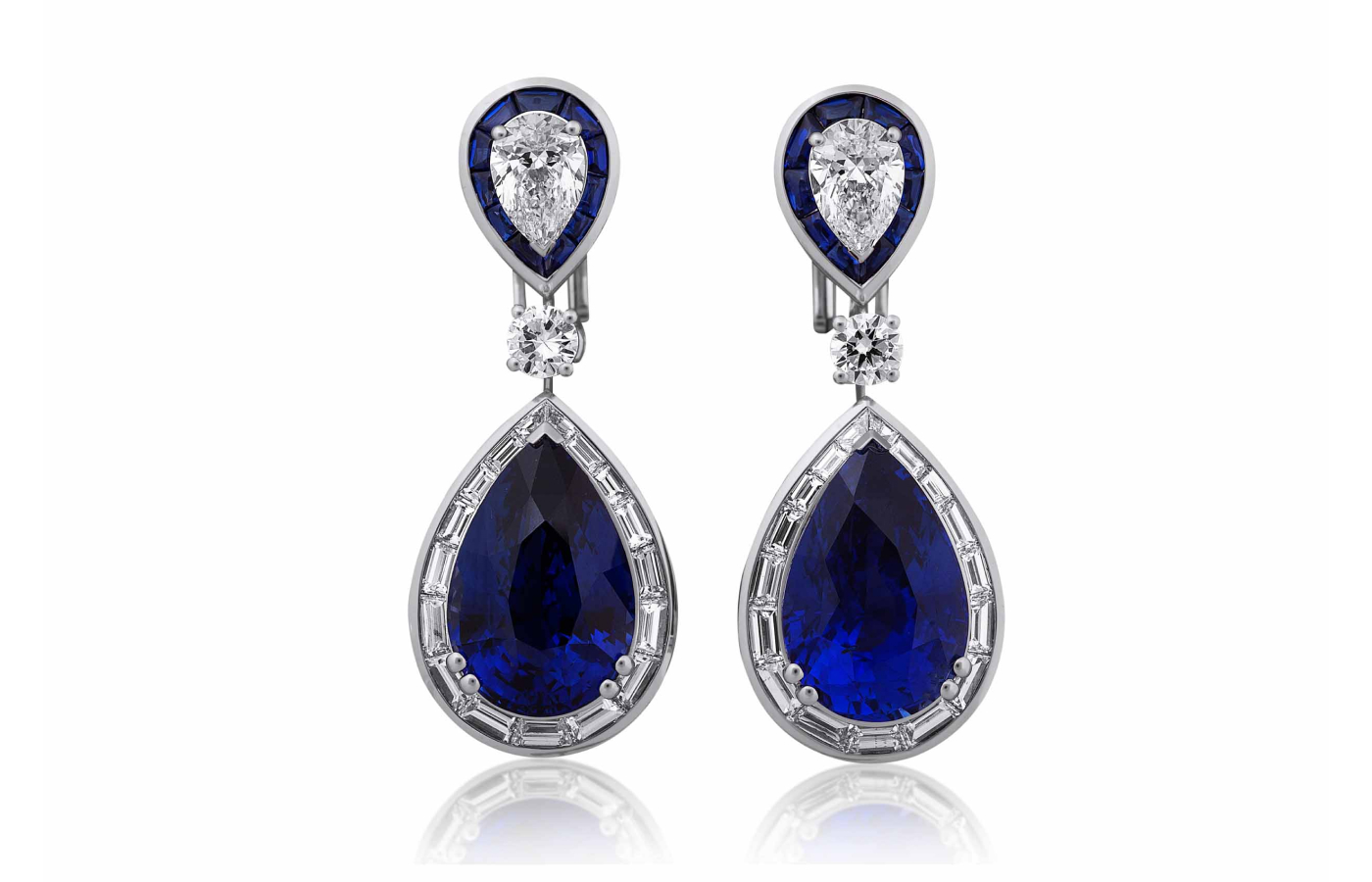  Picchiotti earrings with two pear-shaped Sri Lankan ‘Royal Blue’ sapphires of 11.78 and 11.36 carats, two pear-shaped diamonds totalling 2 carats, round diamonds, buff top sapphires and 2.50 carats of baguette-cut diamonds, set in 18k white gold 