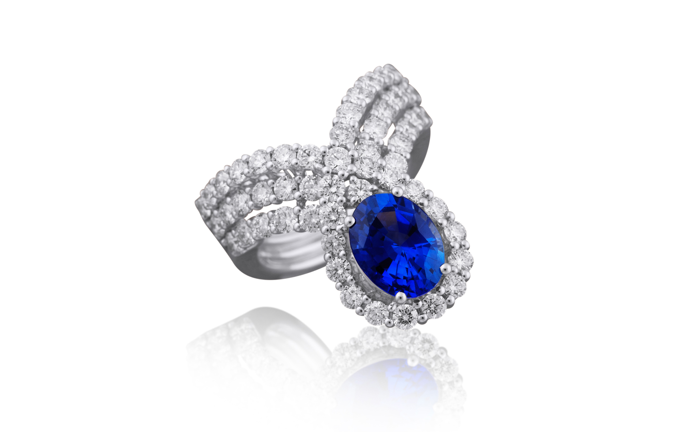  Picchiotti ring with an oval-shaped Sri Lankan sapphire of 2.33 carats and 2.11 carats of round diamonds set in 18k white gold    