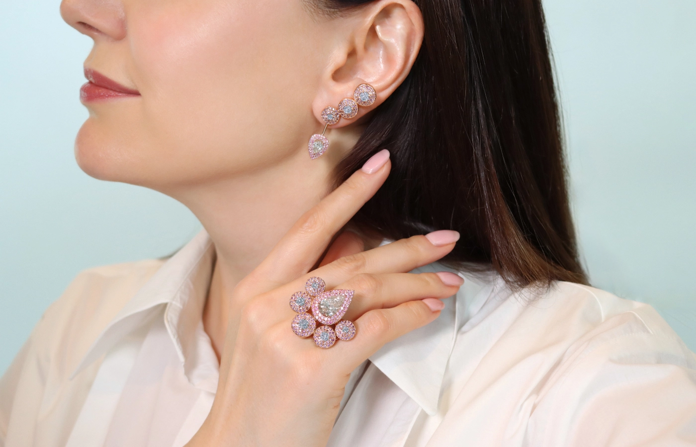  Katerina Perez wears earrings and a ring with osmium from the Collection du Palais by Tania Chano