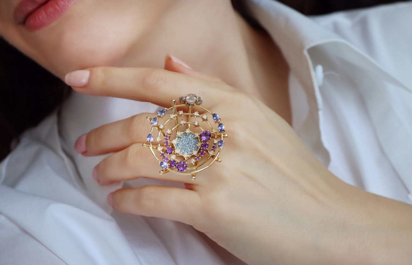 Katerina Perez wears the Supernova ring by Brazilian designer Anthony Garcia with an osmium centre 
