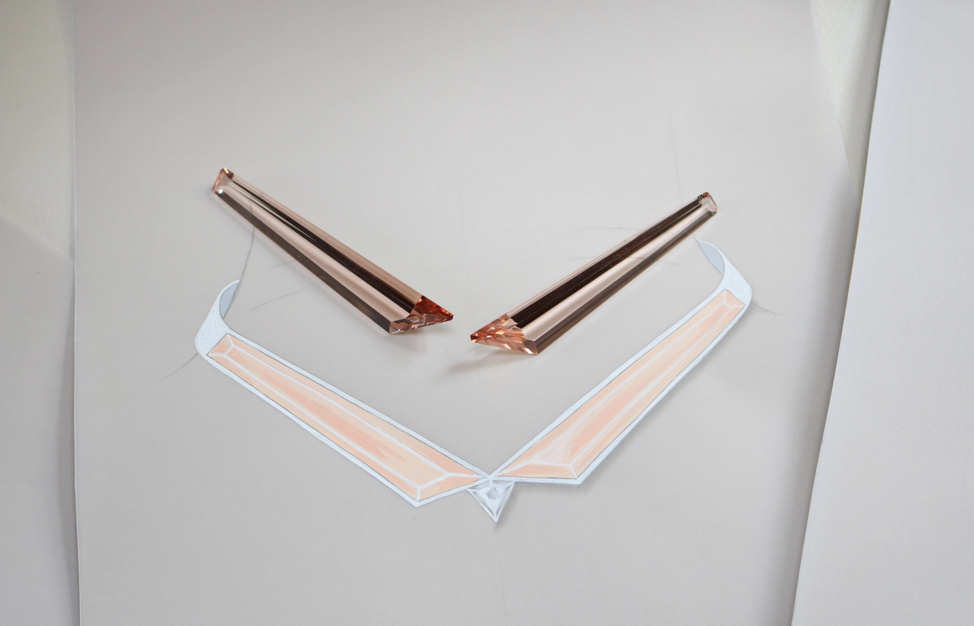  Close up of the trapezium cut morganite pair kept with the gouache of a collar necklace