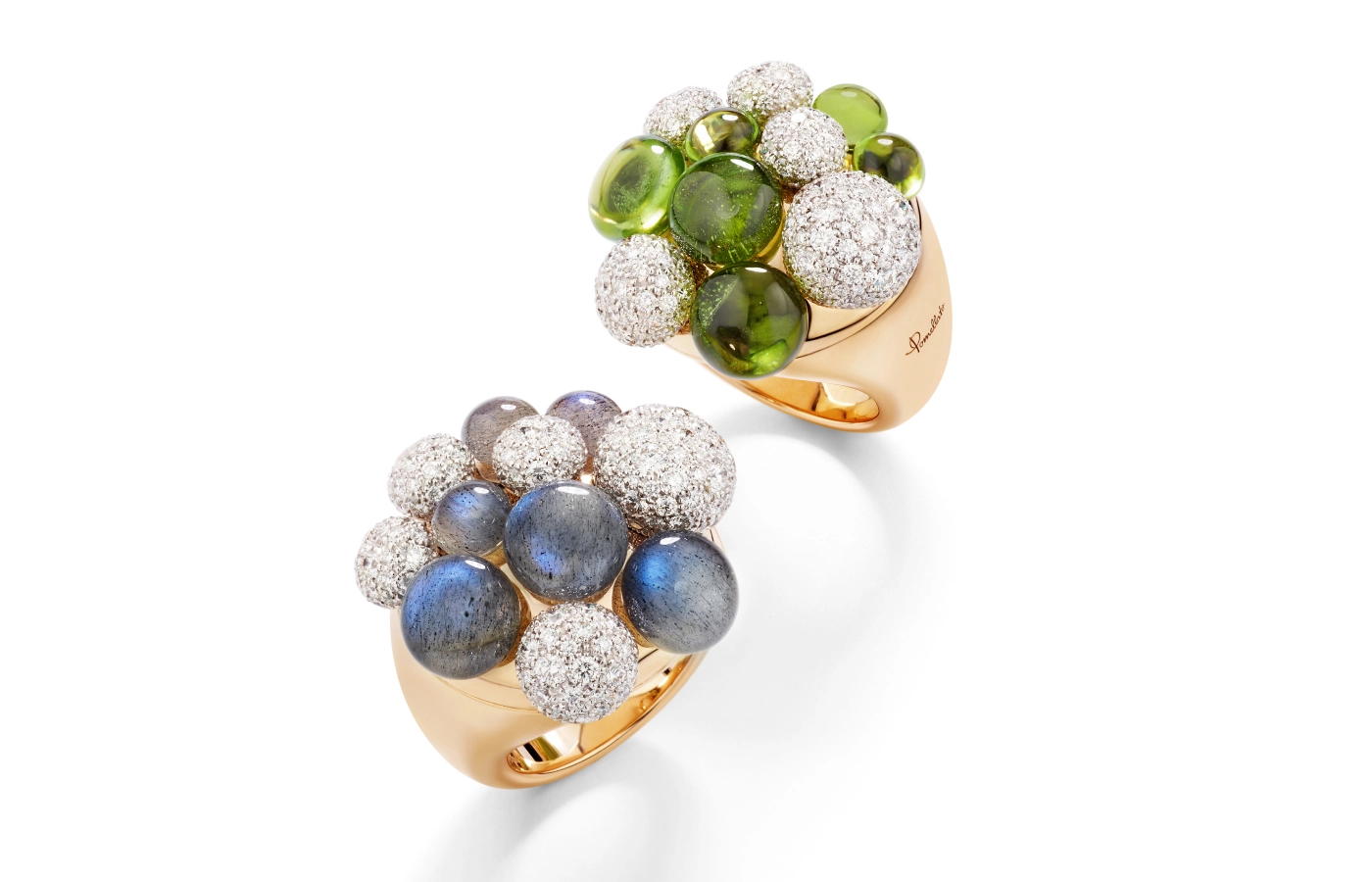 Mora rings by Pomellato featuring clusters of peridots and diamonds (right) and labradorite and diamonds (left), both set in rose gold   