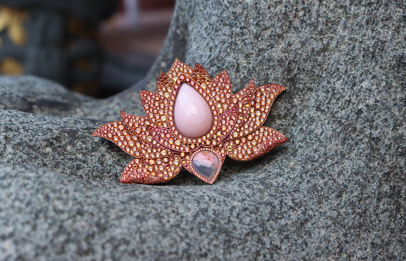 Susana Grau Batlle Evolution through Light ‘Light 1’ brooch with a 24-carat opal, a 6.94 carat agate, and 736 round-cut orange sapphires totalling 28 carats, set in titanium and 18k yellow gold, part of the A Trilogy of Evolution High Jewellery collection