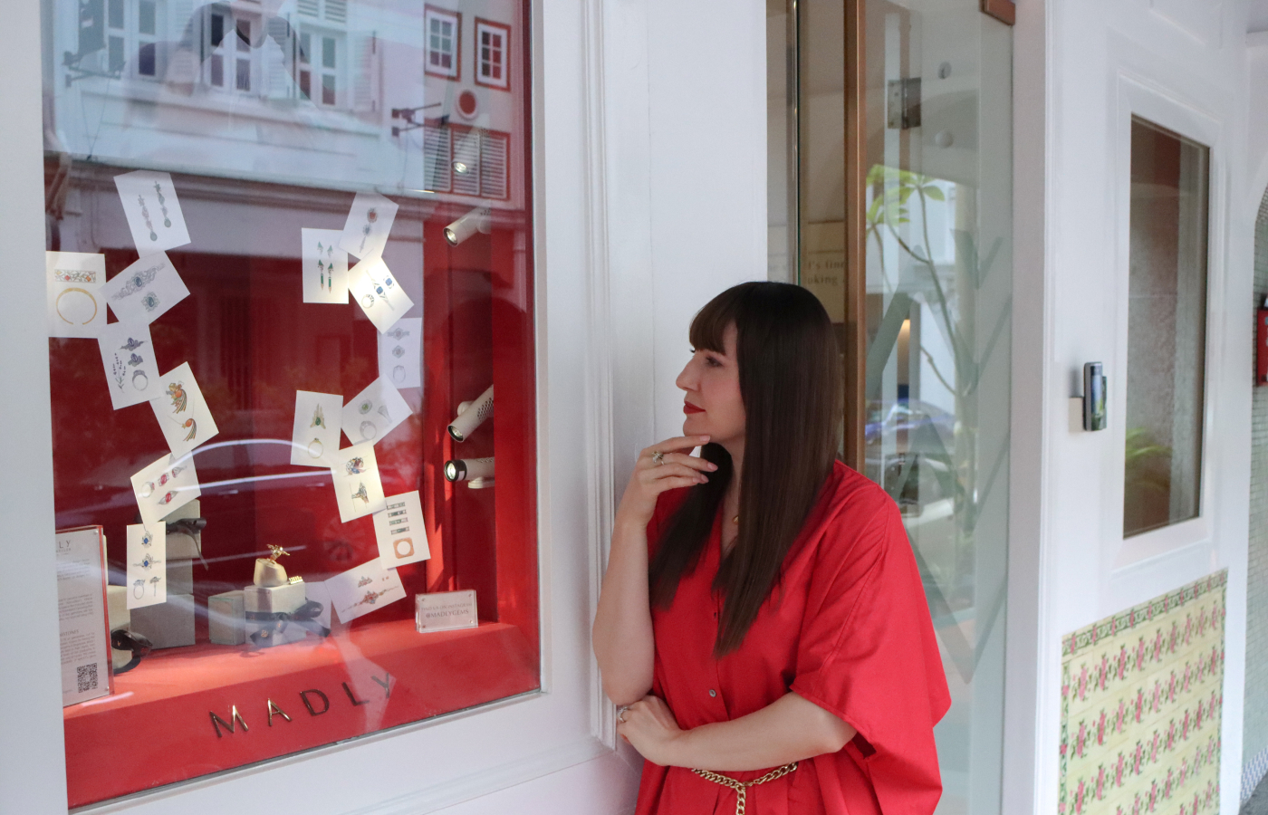 Katerina Perez browses the window displays at the MADLY flagship 'Experience Centre' in Singapore