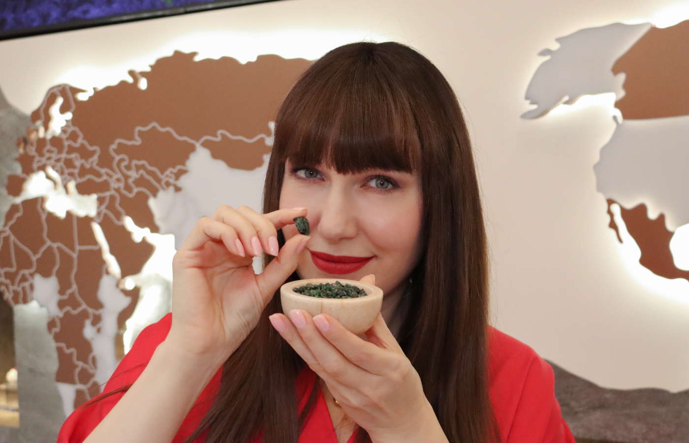 Katerina Perez explores rough gemstones on display at the MADLY flagship 'Experience Centre' in Singapore