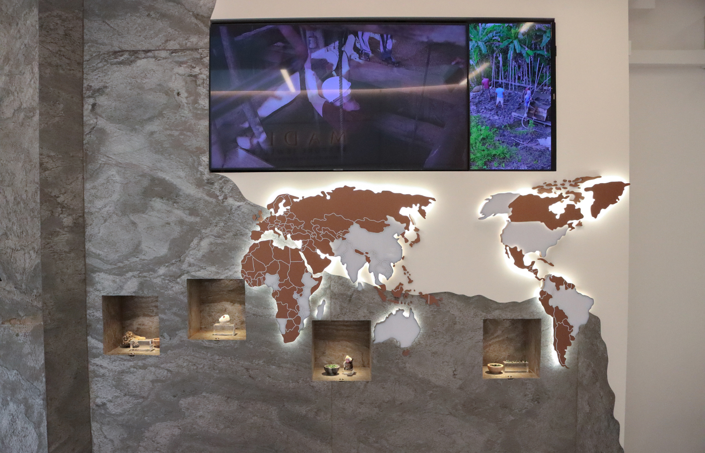  The ‘Straight from the Source’ wall at the MADLY flagship 'Experience Centre' in Singapore, which tells the story of how MADLY opened sourcing offices in Tanzania and Sri Lanka for tourmaline, sapphire, spinel and tsavorite garnet