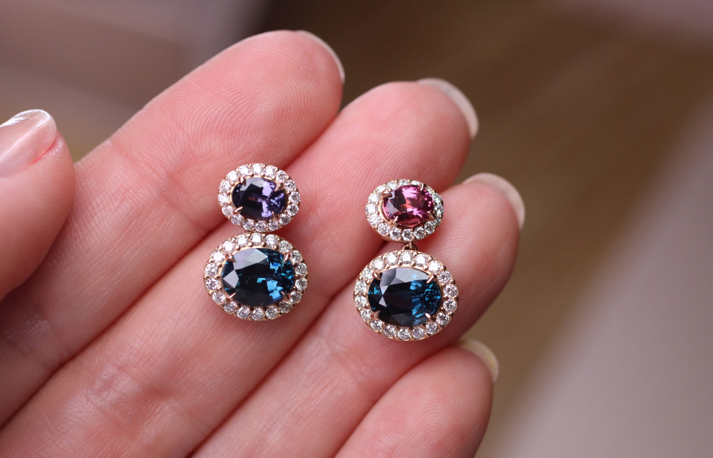  A closer look at the asymmetric colours featured in a pair of earrings by Morebelli, set with 1.22 carats of rhodolite and 2.79 carats of spinel, all sourced from Madagascar