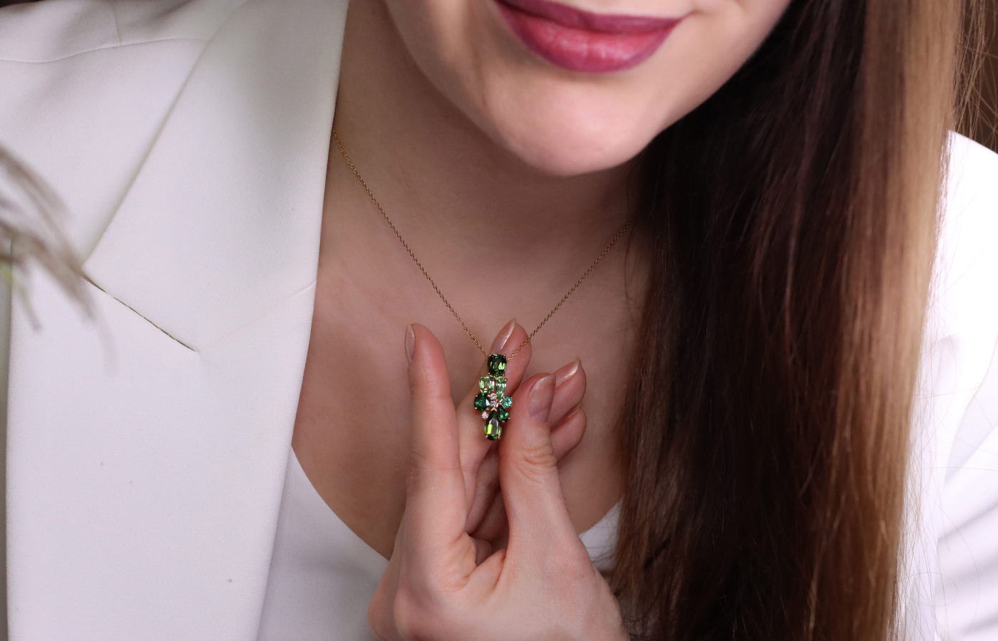  Katerina Perez wears a Morebelli pendant with two tourmalines of 2.49 carats, three tsavorites of 1.50 carats, plus emeralds and Paraiba tourmalines, all hailing from Madagascar