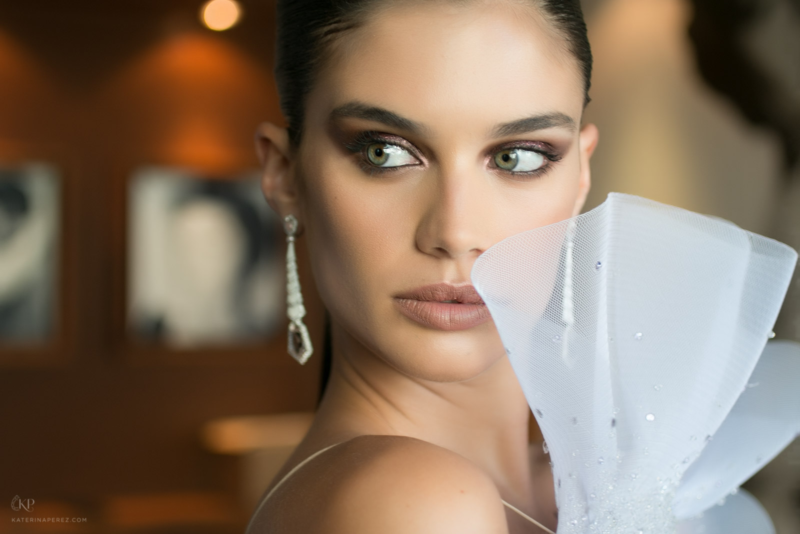 Sara Sampaio wearing AVAKIAN Gatsby earrings with morganites, white enamel and diamonds