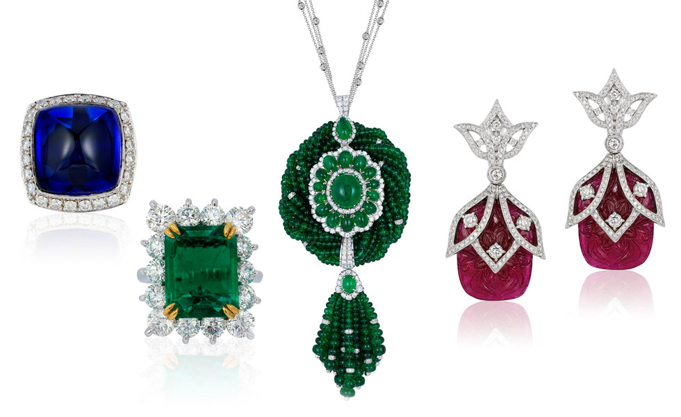 From left to right: Tanzanite ring set in 18K white gold with 58.65cts tanzanite and diamonds;  certified Colombian old mine emerald ring with 6.47 cts emerald and 3.70cts of diamonds; Colombian emerald necklace with cabochons – 47.81 cts, beads – 47.81cts and 10.23cts of diamonds;  carved ruby earrings with 2.28cts of diamonds and 47.74cts of rubies