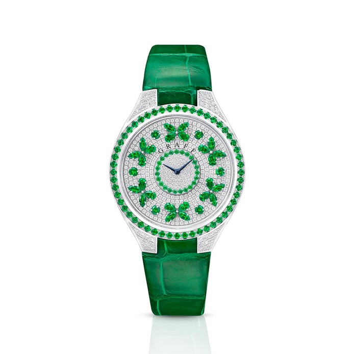 'Butterfly' watch with emeralds and diamonds in white gold