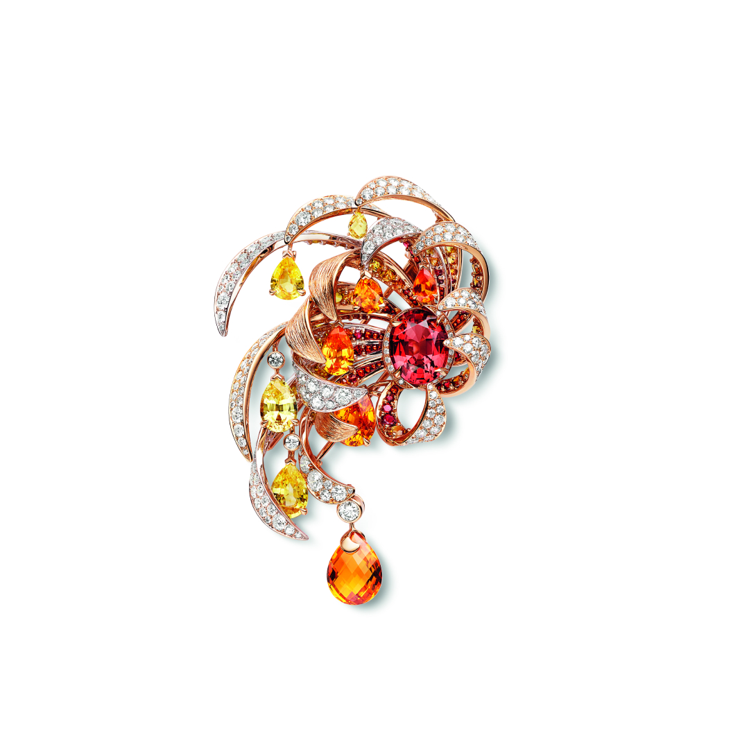 Soleil brooch in gold, garnet, spinel and diamond