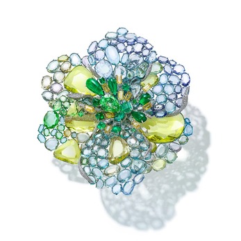 Icy Green Dahlia brooch with Colombian emeralds, double rose-cut purple and yellow sapphires, tanzanites, tsavorites, and diamonds in white gold