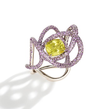 Kephi ring with a yellow sapphire centre stone surrounded by purple sapphires in white gold 