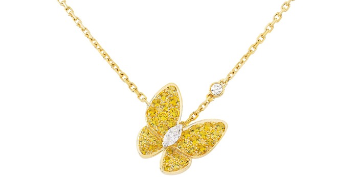 Butterfly pendant with yellow sapphires and a marquise-shaped diamond 'body' 