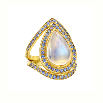 Halo cocktail ring with moonstone and sapphires in yellow gold 