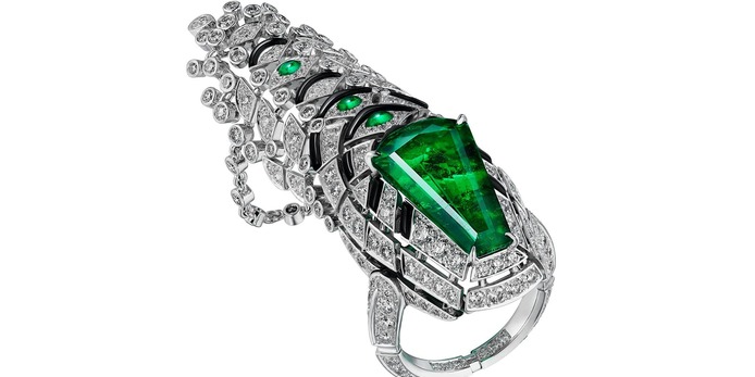 A pendant featuring a 7.27 carat emerald that can also be worn as a ring 