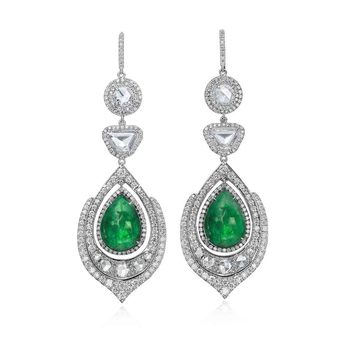 Earrings in 18k white gold with 3.87 carats of rose-cut diamonds and 9.84 carats of Cabochon emeralds, plus a further 3.65 carats of pave diamonds 