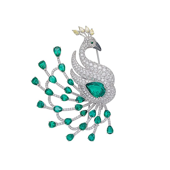 Peacock brooch with a 5.77 carat pear-shaped emerald, a further 20 carats of pear-shaped emeralds and 10 carats of white and yellow diamonds 