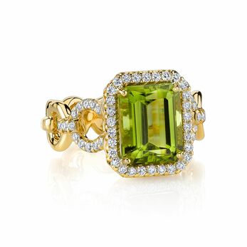 Buckle ring with peridot and diamonds in yellow gold 