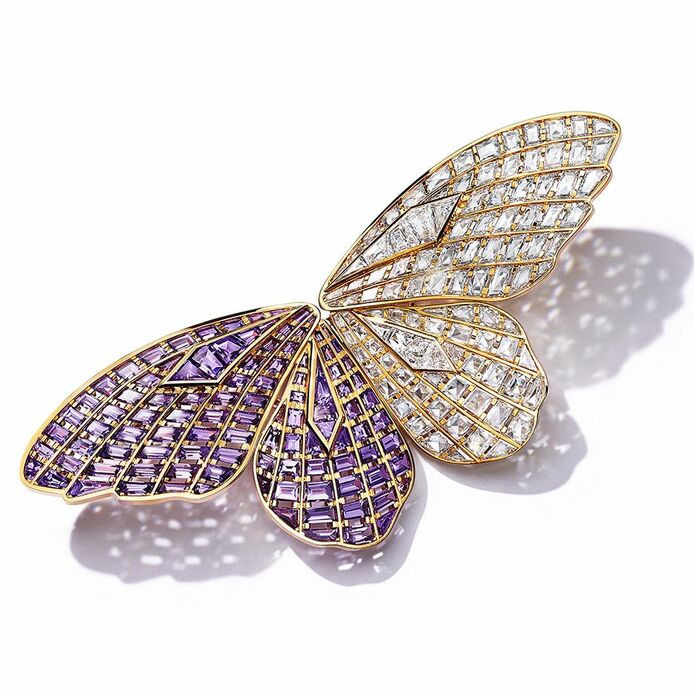 Sky butterfly brooch from the Colors of Nature High Jewellery Collection, crafted in 18k yellow gold with custom-cut purple sapphires of over 8 carats and cracked-ice and custom-cut baguette diamonds of over 11 carats