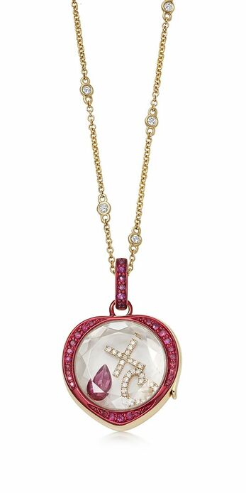Chromatopia locket set with rubies and decorated with red enamel on 14K yellow gold