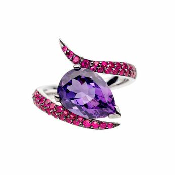 Aurora ring with a pear-shaped amethyst of 2.93 carats surrounded by rubies in 18k white gold 