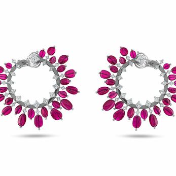 High Jewellery earrings featuring diamonds and precious gemstones