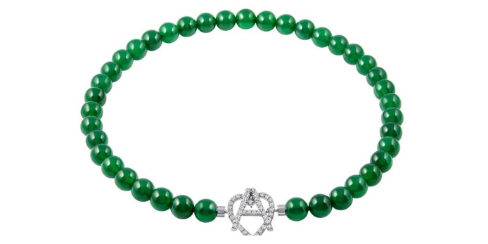 Bracelet in white gold, green gemstones and diamond