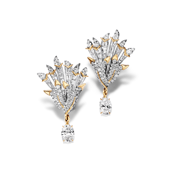 Set in platinum and 18k yellow gold with a pair of diamonds of over four total carats and diamonds from the 2023 Blue Book collection