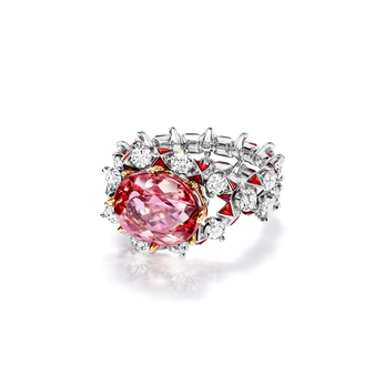 Set in platinum and 18k yellow gold with an Imperial topaz of over 6 carats, carnelians and diamonds from the 2023 Blue Book collection
