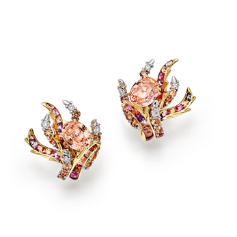 Set in platinum and 18k yellow gold with unenhanced orange sapphires of over 9 total carats, unenhanced padparadscha sapphires and diamonds from the 2023 Blue Book collection