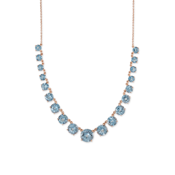 Necklace in gold featuring graduated round blue topaz