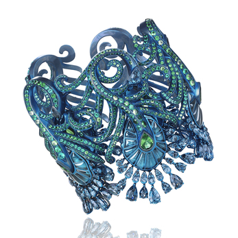 High jewellery cuff with topaz, tourmalines, tsavorites and emeralds in titanium 
